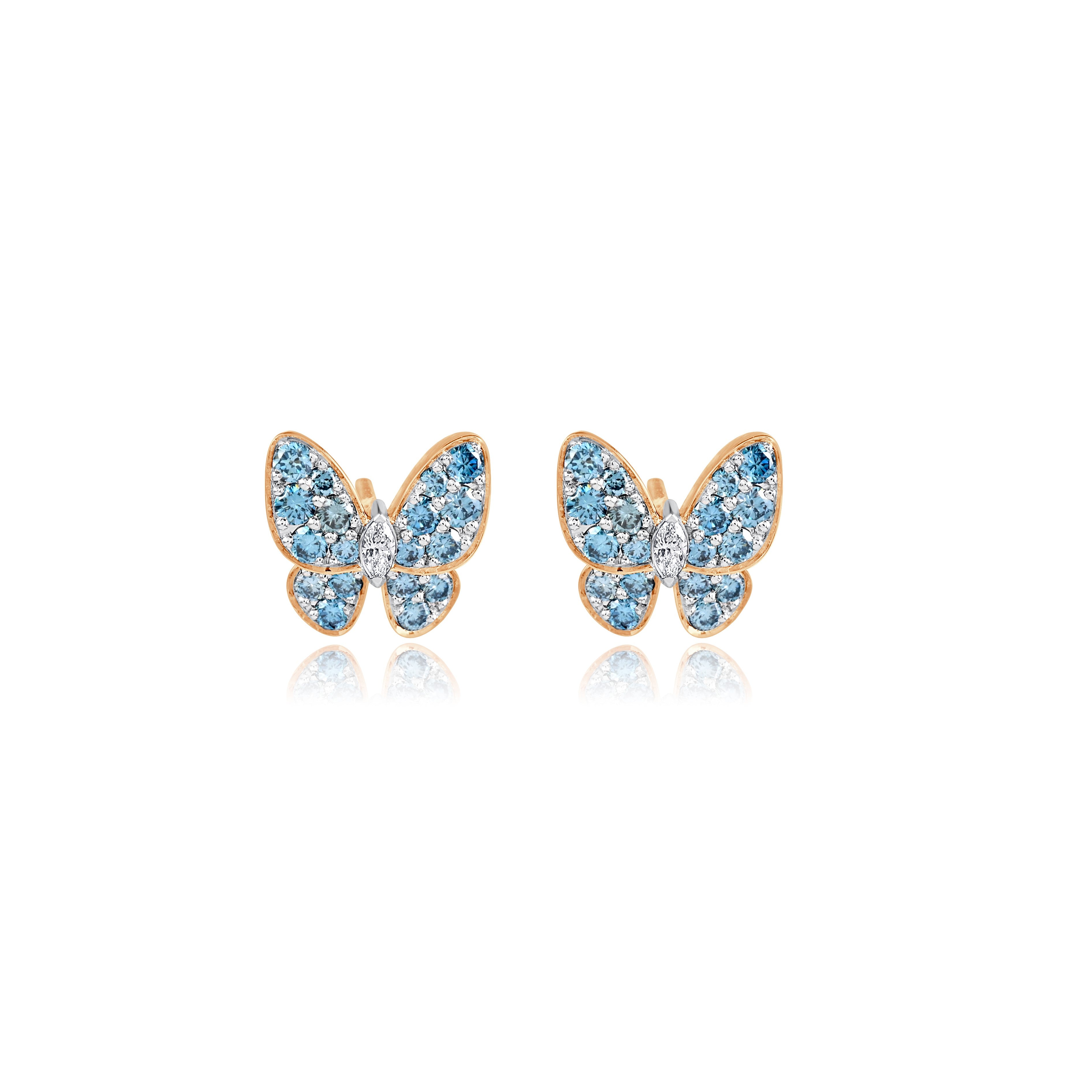 Butterfly-shaped lab grown earrings with blue gemstones
