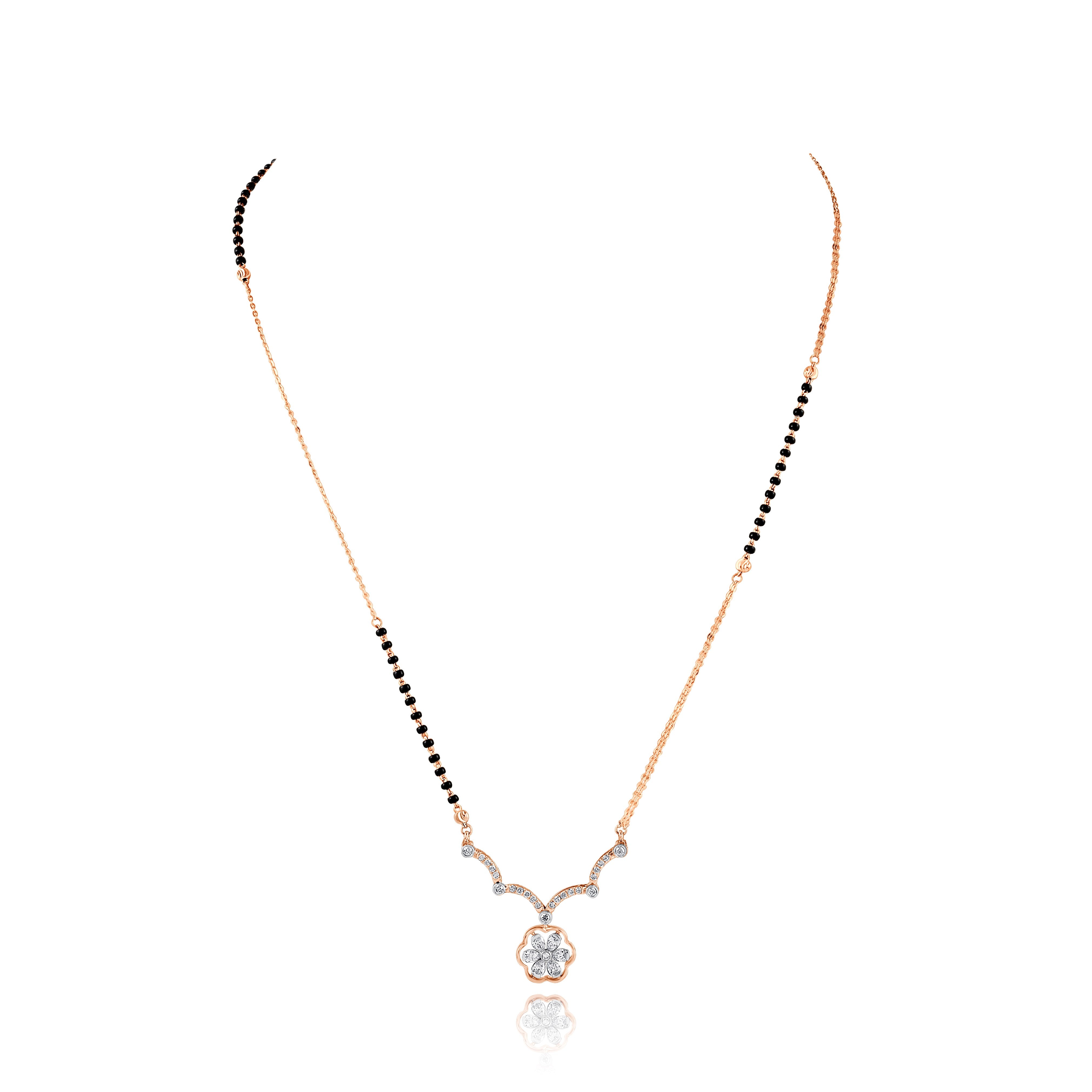 Necklace with black beaded chain and rose gold 