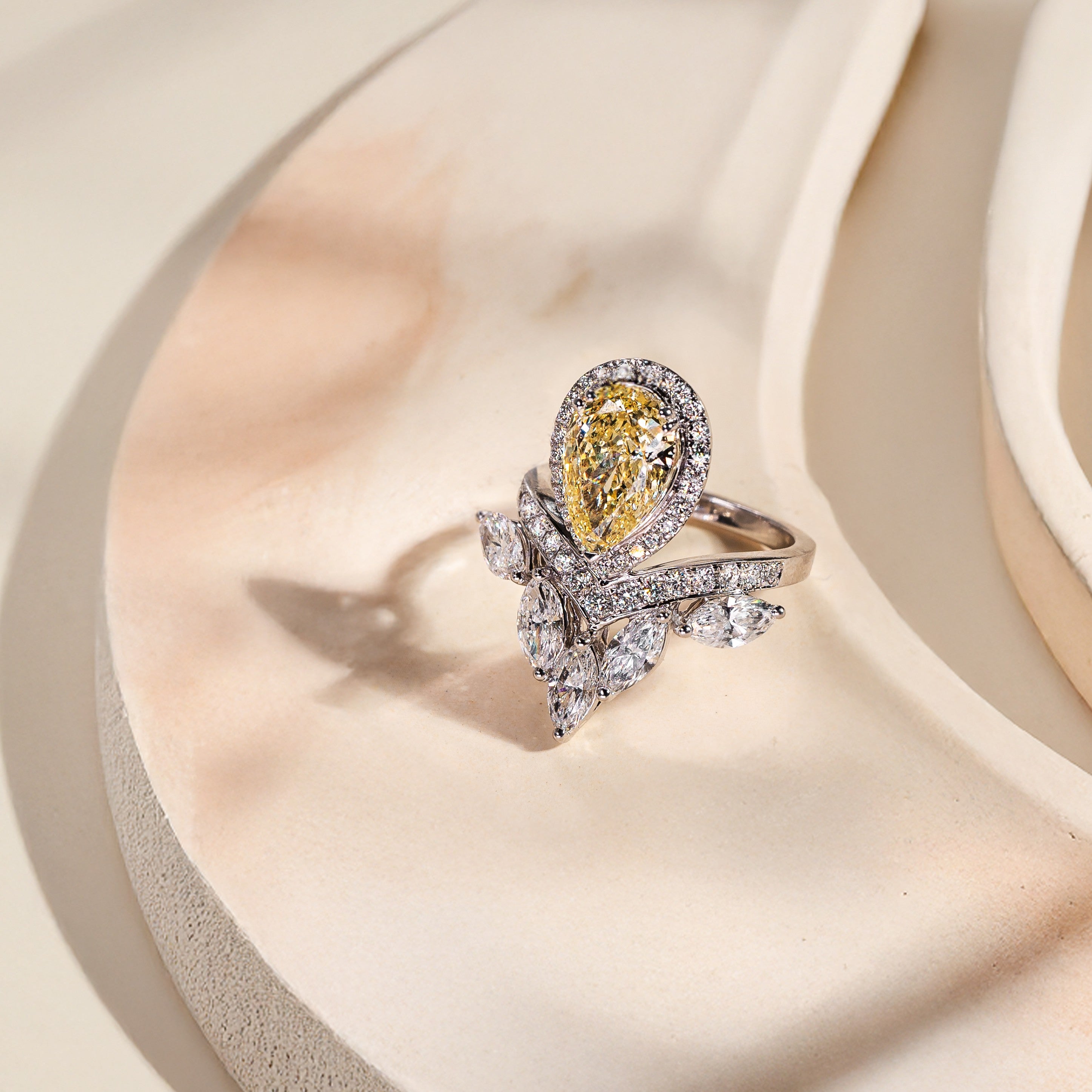 Gold ring with a pear-shaped lab grown diamond